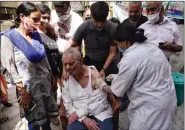  ??  ?? A senior citizen gets a dose of Covid-19 Vaccine at a dispensary, in Ghaziabad on Saturday. ANI
