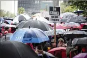  ?? DAVID CRANE — THE ORANGE COUNTY REGISTER VIA AP ?? Staff workers, teachers and students hold a protest outside of the LAUSD headquarte­rs in Los Angeles on Wednesday.