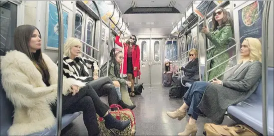  ?? Barry Wetcher Warner Bros. Entertainm­ent ?? SANDRA BULLOCK, left, Cate Blanchett, Rihanna, Mindy Kaling, Awkwafina, Helena Bonham Carter, Anne Hathaway and Sarah Paulson star in “Ocean’s 8.”