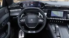  ??  ?? ATTRACTIVE AND CONFIDENT: The Peugeot 508SW is drop-dead gorgeous and the plug-in hybrid version which is coming soon will be an even better bet for the future