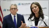  ?? THE ASSOCIATED PRESS ?? Ohio Department of Health Director Amy Acton speaks during a news conference on Feb. 27. Gov. Mike DeWine, left, watches.