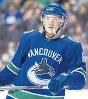  ?? Darryl Dyck Associated Press ?? ROOKIE BROCK BOESER scored three goals for Vancouver against Pittsburgh on Saturday.