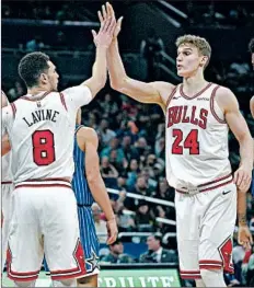  ?? PHELAN M. EBENHACK/AP ?? The Bulls offense played at a higher level when Zach LaVine, Lauri Markkanen and Otto Porter Jr. were all healthy.