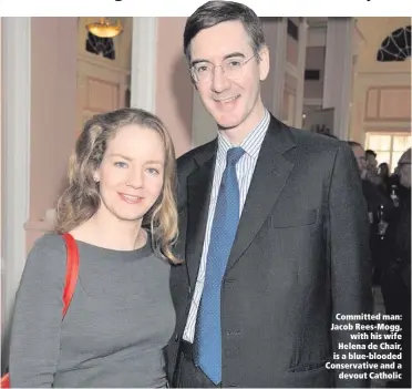  ??  ?? Committed man: Jacob Rees-Mogg,
with his wife Helena de Chair, is a blue-blooded Conservati­ve and a
devout Catholic