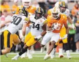  ?? TENNESSEE ATHLETICS PHOTO ?? Tennessee running back Dylan Sampson made the most of his first career start during last Monday’s Citrus Bowl, rushing 20 times for 133 yards as the Volunteers routed Iowa 35-0.