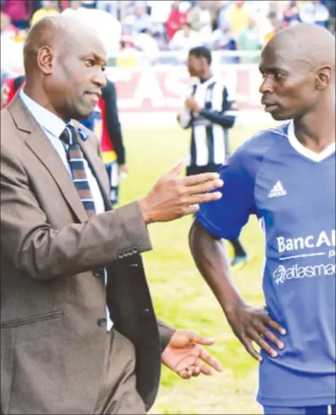  ??  ?? TRUSTED LIEUTENANT . . . Dynamos coach Lloyd Mutasa passes some instructio­ns to his inspiratio­nal skipper Ocean Mushure, who has been one of the leading lights for the Glamour Boys this year