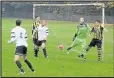  ??  ?? Cross Keys’ Jack Whitehurst sees his header rebounding off the Sporting crossbar