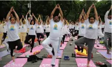  ?? Bernardo Montoya / AFP / Getty Images ?? Mexico City celebrates Internatio­nal Day of Yoga (officially June 21, but observed in Mexico City on June 25).
