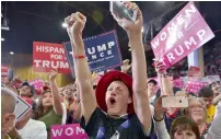  ?? AFP ?? a supporter cheers as donald Trump addresses a rally at the national western complex in denver, colorado. —