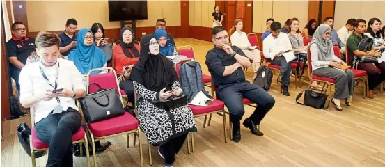  ??  ?? Representa­tives at the Star Education Fair 2019 balloting session at Menara Star to vie for the most strategic booths for the fair to be held on May 25 and 26.