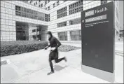  ?? Reed Saxon Associated Press ?? YEAR OVER YEAR, the education and health sector added 82,800 jobs, the largest jump in California.