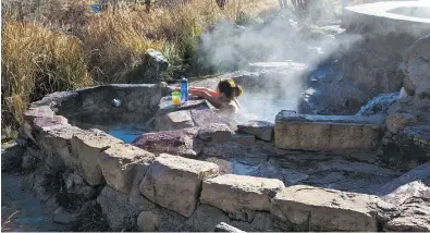  ??  ?? Montezuma Hot Springs, 6 miles northwest of Las Vegas, N.M., on N.M. 65, has been a gathering place for centuries. Although alcohol is prohibited, consumptio­n persists, a college spokeswoma­n says.