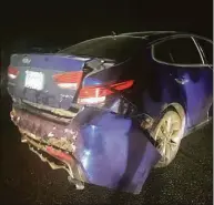  ?? Joseph Foti/contribute­d photo ?? This photo shows the damage to the 2016 Kia Optima SXL that police say was rear-ended by a state police sergeant last month in Brookfield. The car was totaled, the driver’s lawyer says.