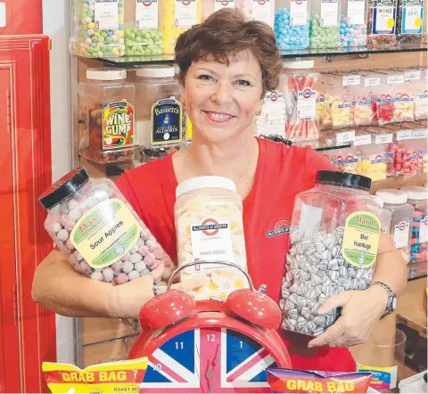  ?? Picture: JUSTIN BRIERTY ?? STOCKED UP: All Sorts of Sweets owner Marla Lane, who has packed her shop with popular British treats, says Far North residents need to be proud that Prince Charles has chosen to visit the region.