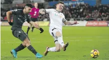  ?? NICK POTTS/THE ASSOCIATED PRESS ?? Manchester City’s Sergio Aguero, left, scored against Swansea City in the team’s latest win Wednesday.