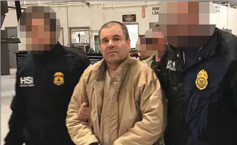  ?? AFP ?? Joaquin Guzman Loera aka El Chapo Guzman (middle), being escorted in Ciudad Juarez by the Mexican police durings his extraditio­n to the United States