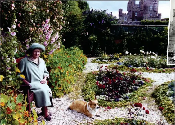  ??  ?? GARDEN OF DELIGHTS: The popular member of the Royal Family with one of her beloved corgis, enjoying the fresh Caithness air at her Highland home