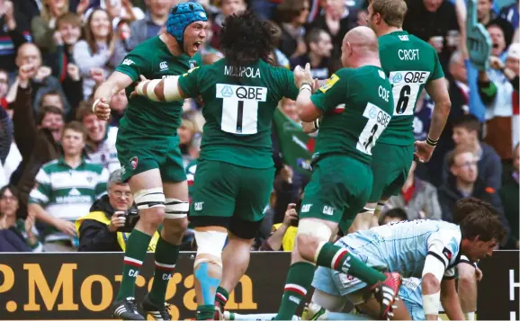  ??  ?? Great days: Pack power helps Tigers become champions in 2013 as Graham Kitchener, left, scores their second try against Northampto­n