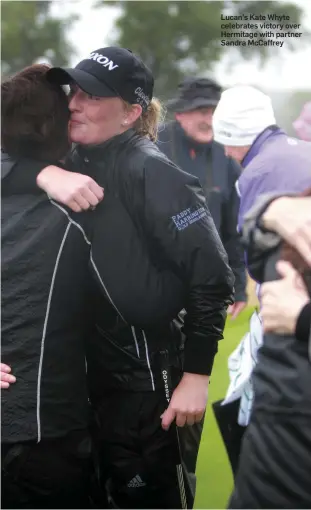  ??  ?? Lucan’s Kate Whyte celebrates victory over Hermitage with partner Sandra McCaffrey