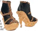  ??  ?? Angel wing gold and black platform ankle boots by Alexander McQueen