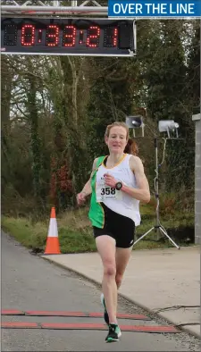  ??  ?? Fionnuala McCormack crosses the line to win the women’s section of the Enniscorth­y 10k on Sunday.