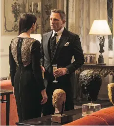  ?? MGM ?? Monica Bellucci, left, and Daniel Craig appear in Spectre. Much was made of their closeness in age, but her role was brief and predictabl­e.