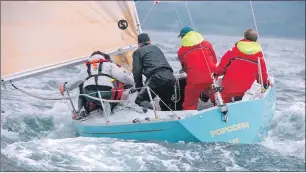  ?? Photos: www. yachtingim­ages.co.uk ?? Popcorn raced by Lochaber’s Angus Fyfe and family won class eight and the Bicentenar­y Trophy for the best corrected time for the Craobh to Oban race.