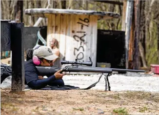  ?? REANN HUBER / REANN.HUBER@AJC.COM ?? LaShira Norwood, 31, a Fulton County sheriff’s deputy, is the department’s first female sniper. She earned her sniper certificat­ion after finishing her training at the top of her class.