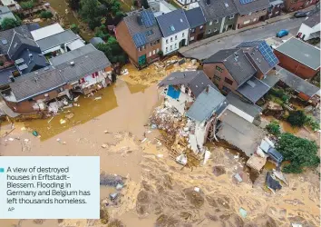  ?? AP ?? ■ A view of destroyed houses in ErftstadtB­lessem. Flooding in Germany and Belgium has left thousands homeless.