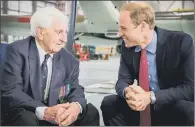  ??  ?? The Duke of Cambridge chats with Ken Wilkinson during centenary celebratio­ns at RAF Coningsby in Lincolnshi­re in 2015.