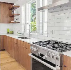  ??  ?? Subway tile, no matter where it’s used in a home, is a timeless finish, according to Bobby Berk. In a kitchen, it makes a great backsplash.