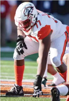  ?? AP PHOTOS ?? Sixth-round pick Zachary Thomas (left) and fifth-rounder Braxton Jones are two of the rookies in the mix for playing time on a revamped Bears offensive line.