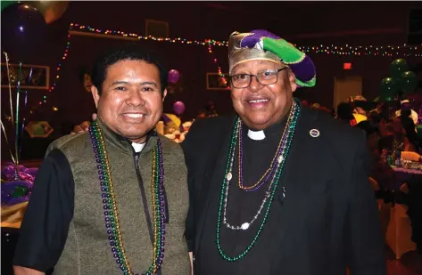  ?? (Special to The Commercial/Richard Ledbetter) ?? Pine Bluff’s Rev. Andreas Kedati (left) and Little Rock’s Rev. Warren Harvey mingle with St. Peter parishione­rs.