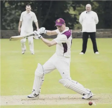  ??  ?? WATCHING IT GO: Chris Whitwell bats for Sowerby Bridge against Booth. Photo: Jim Fitton.