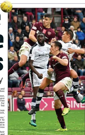  ??  ?? BREAKTHROU­GH: Callum Paterson leaps the highest to open the scoring for Hearts and (below) is congratula­ted by delighted Tynecastle team-mates