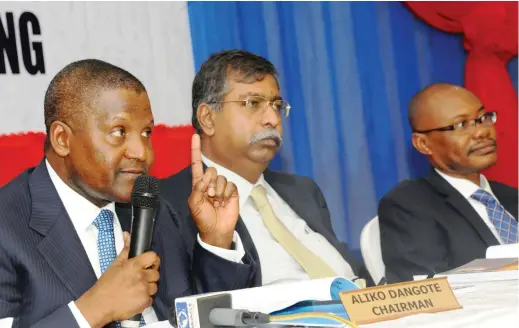  ??  ?? From left: Chairman, Dangote Cement PLC, Aliko Dangote; GMD/CEO, Dangote Cement PLC Mr. D.V.G Edwin and Director, Dangote Cement PLC, Mr. Olakunle Alake at the 5th AGM, in Lagos, on Friday