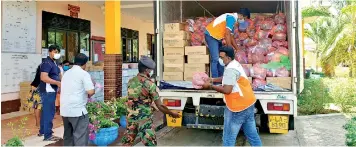  ??  ?? Dry rations being distribute­d.