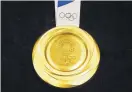  ?? KOJI SASAHARA/ASSOCIATED PRESS ?? Tokyo Olympic Games organizers showed off the medals to be given out at the 2020 competitio­n.