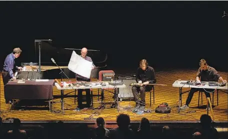  ?? Pomona College Department of Music ?? INTERPRETI­NG John Cage’s “Electronic Music for Piano” are Gino Robair, left, David Toop, Thurston Moore and Jon Leidecker.