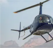  ??  ?? A helicopter inspects forests as part of fire prevention measures in Shanxi Province, north China, on April 6