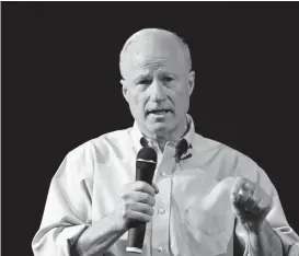  ?? Denver Post file ?? U.S. Rep. Mike Coffman, a Republican, answers questions during his town hall in Henderson in August 2017. Coffman has never lost an election.