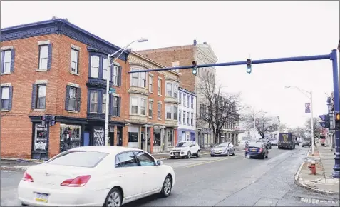  ?? Photos by Paul Buckowski / Times Union ?? A view of a section of the business district along Second Ave. on Tuesday in Troy.