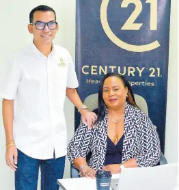  ?? CONTRIBUTE­D ?? Collet Kirkcaldy, general manager at Century 21 Jamaica, and Jordan Chin, executive chairman, showcase the team spirit during a recent activation event by Century 21.