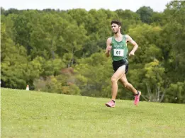  ?? JOHN GILLIS/FOR CAPITAL GAZETTE ?? Arundel’s Zaiden Lane won the boys large school race.