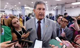  ?? Photograph: Michael Reynolds/EPA ?? Joe Manchin, Democratic senator from West Virginia, speaks to the media at the Senate subway during a Senate vote on Capitol Hill, on 21 September.