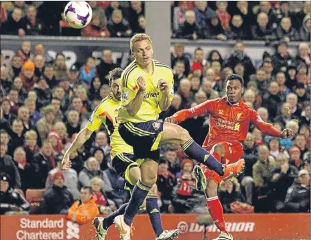  ?? Picture: PA. ?? Daniel Sturridge fires in Liverpool’s second and his 20th league goal of the season.