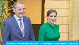  ?? — AFP ?? REYKJAVIK: President of Iceland, Gudni Th Johannesso­n and his wife Eliza Reid arrive to celebrate his re-election at a hotel in the Icelandic capital Reykjavik, Iceland.