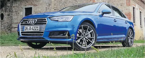  ?? PHOTOS: LESLEY WIMBUSH/ DRIVING ?? Although the new A4 looks much like its predecesso­r, improved aerodynami­cs and a 120- kg weight reduction help it use up to 21 per cent less fuel.