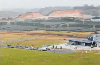  ?? Photo / File ?? Before the after. Tauriko Business Estate pictured in 2011 showing the earthworks for Stage 2, at the end of the first developed stage.