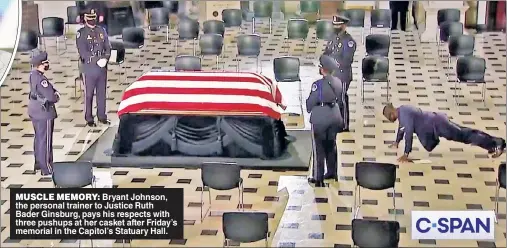  ??  ?? MUSCLE MEMORY: Bryant Johnson, the personal trainer to Justice Ruth Bader Ginsburg, pays his respects with three pushups at her casket after Friday’s memorial in the Capitol’s Statuary Hall.